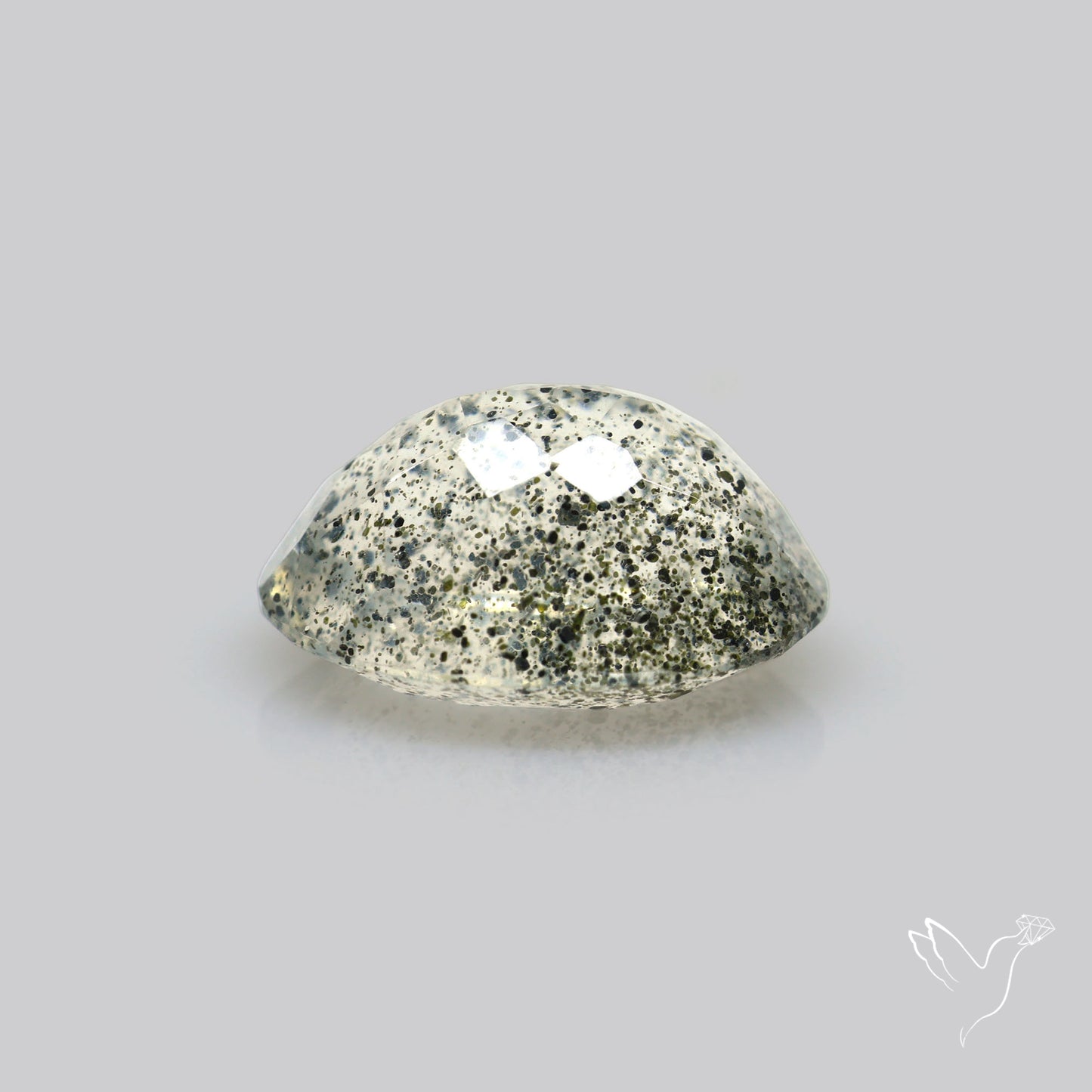 Faceted Diopside In Quartz