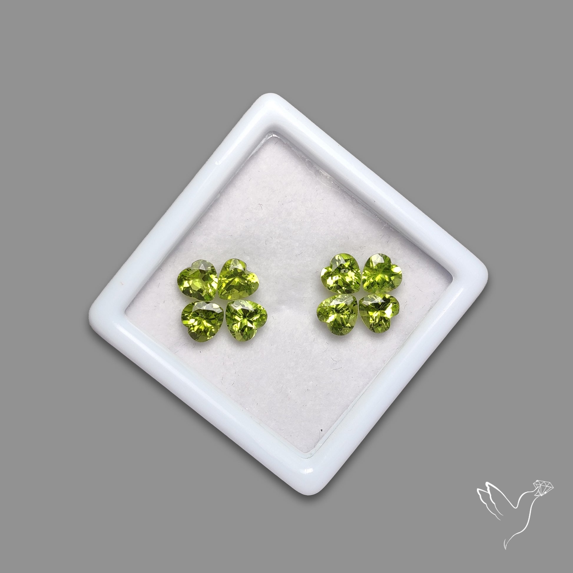 Faceted Peridot Hearts Set Fine Gemstones