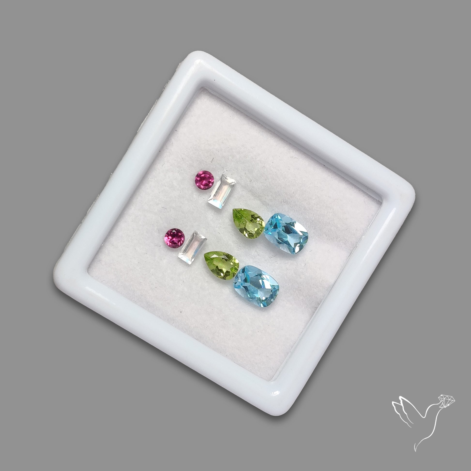 Faceted Rubellite Tourmaline, Peridot, Malagasy Rainbow Moonstone , Blue Topaz Set