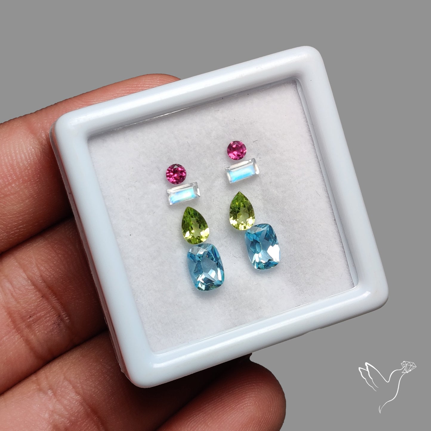 Faceted Rubellite Tourmaline, Peridot, Malagasy Rainbow Moonstone , Blue Topaz Set