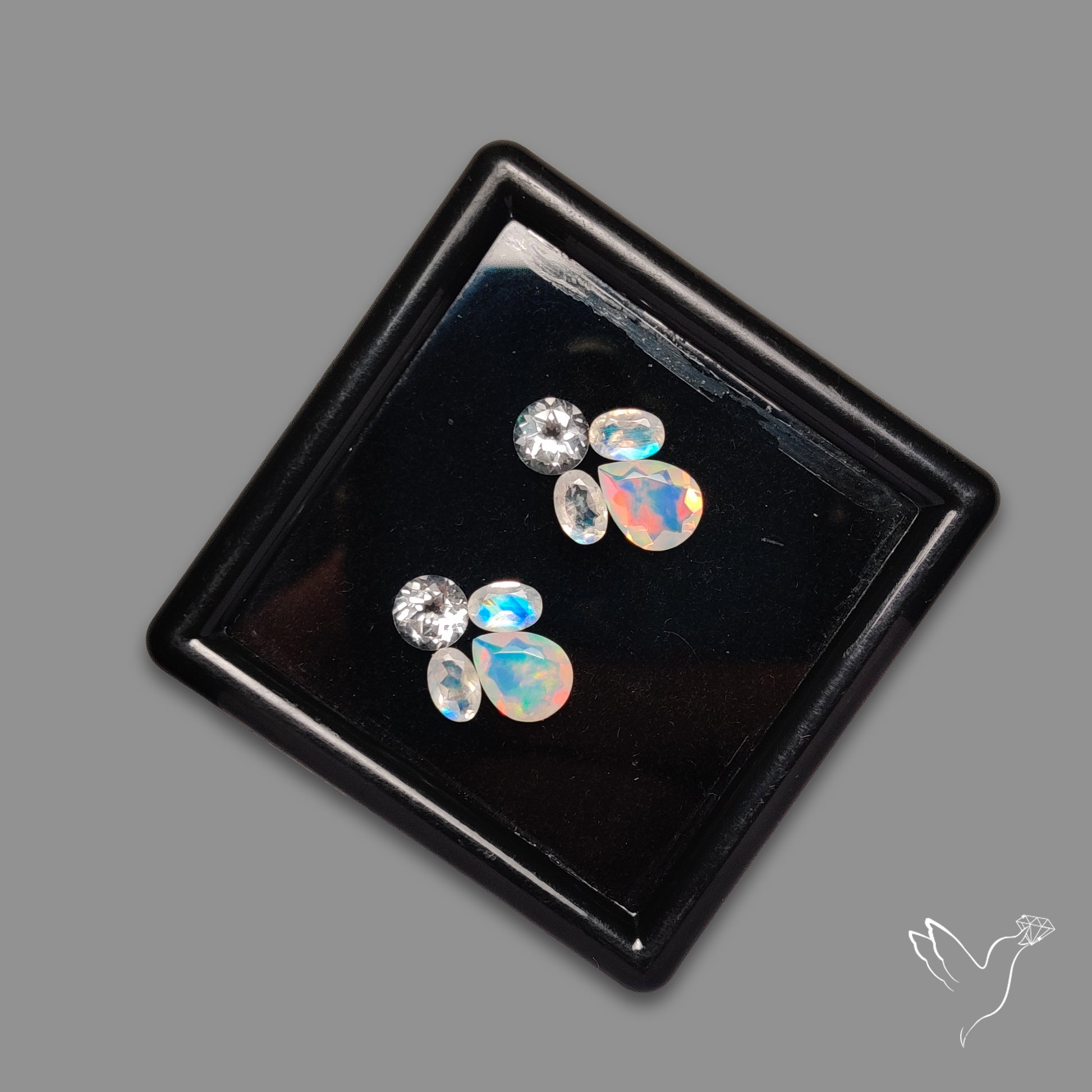 Faceted Clear Quartz, Ethiopian Opals With Rainbow Moonstones Set