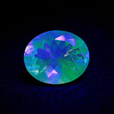 Hyalite Opal Faceted Fluorescent under UV Light