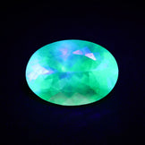 Hyalite Opal Faceted Fluorescent under UV Light