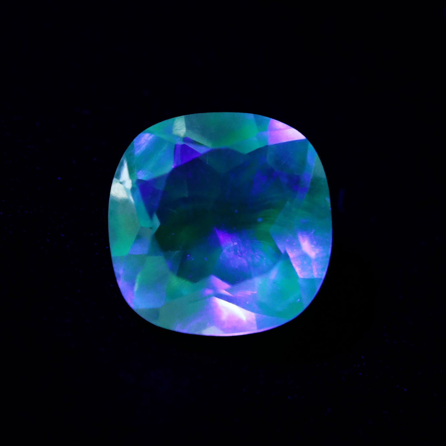 Hyalite Opal Faceted Fluorescent under UV Light