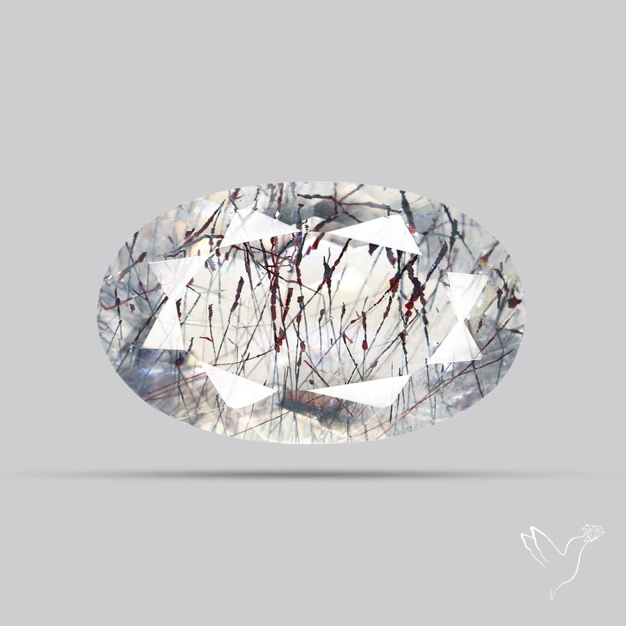 Lepidocrocite and Goethite In Quartz Faceted Fine Gemstone