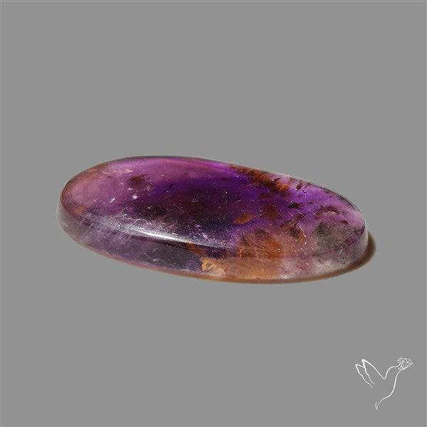 Super Seven Amethyst with Cacoxenite Cabochon