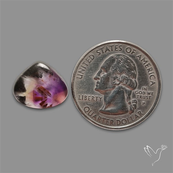 Super Seven Amethyst with Cacoxenite Cabochon
