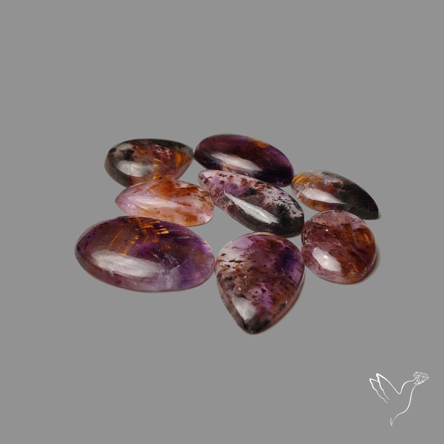 Cacoxenite In Amethyst Cabochons Lot