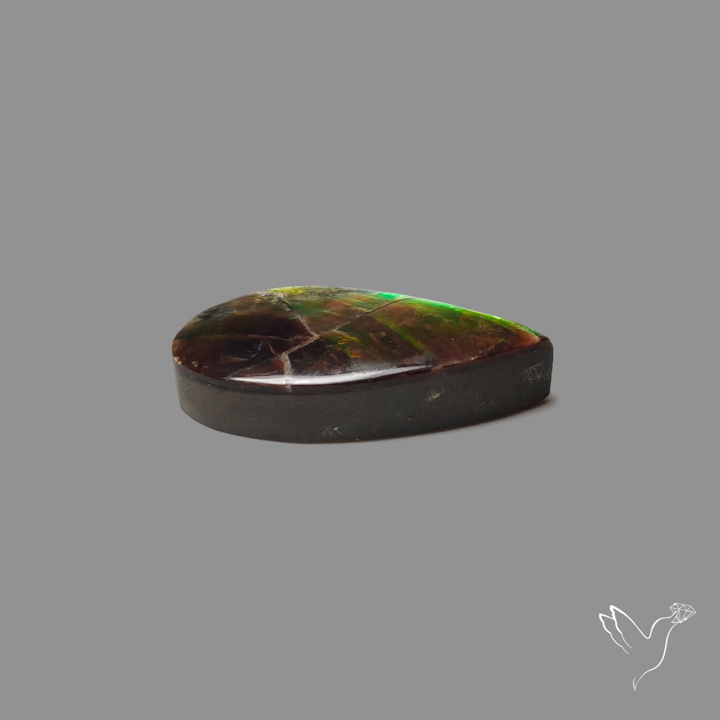 AAA Multi Flash Green Ammolite Cabochon