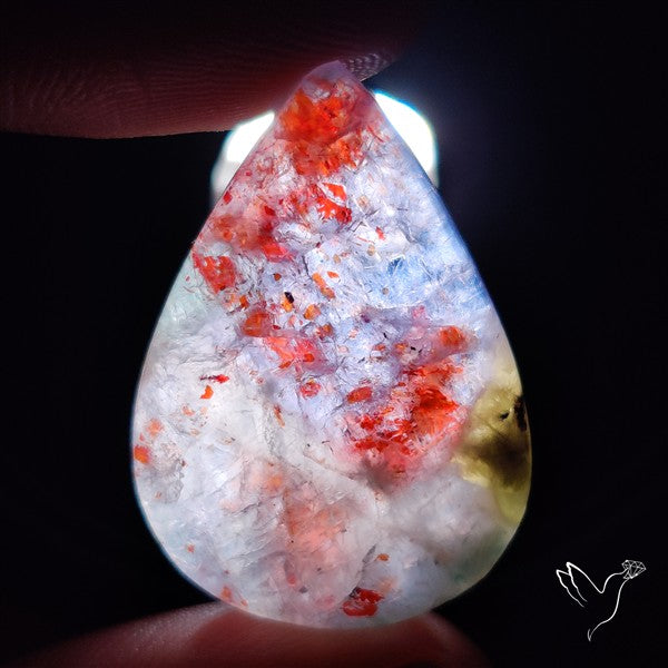 Bloodshot Iolite Sunstone Cabochon with Green Tourmaline Inclusion