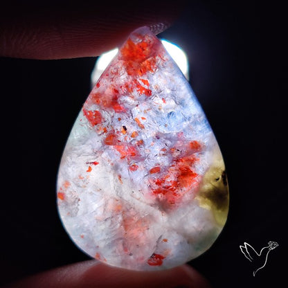 Bloodshot Iolite Sunstone Cabochon with Green Tourmaline Inclusion
