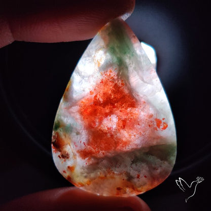 Bloodshot Iolite Sunstone Cabochon with Green Tourmaline Inclusion