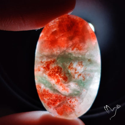 Bloodshot Iolite Sunstone Cabochon with Green Tourmaline Inclusion