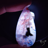 Bloodshot Iolite Sunstone Cabochon with Green Tourmaline Inclusion