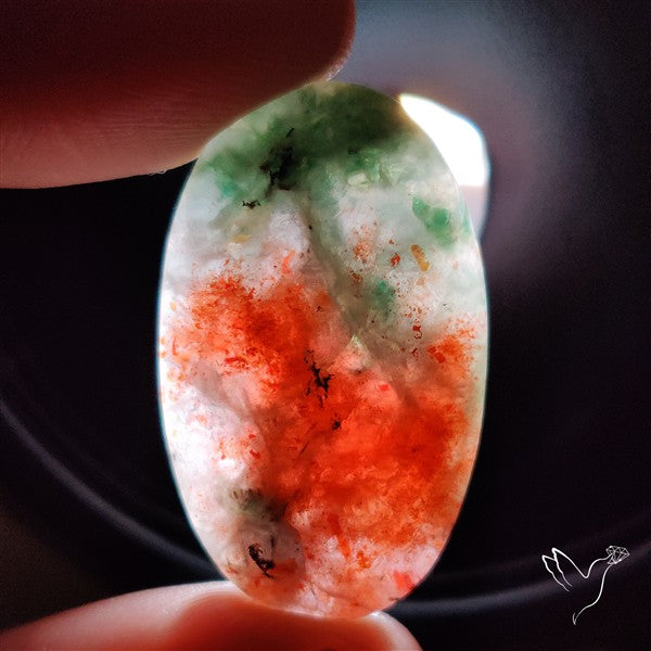 Bloodshot Iolite Sunstone Cabochon with Green Tourmaline Inclusion