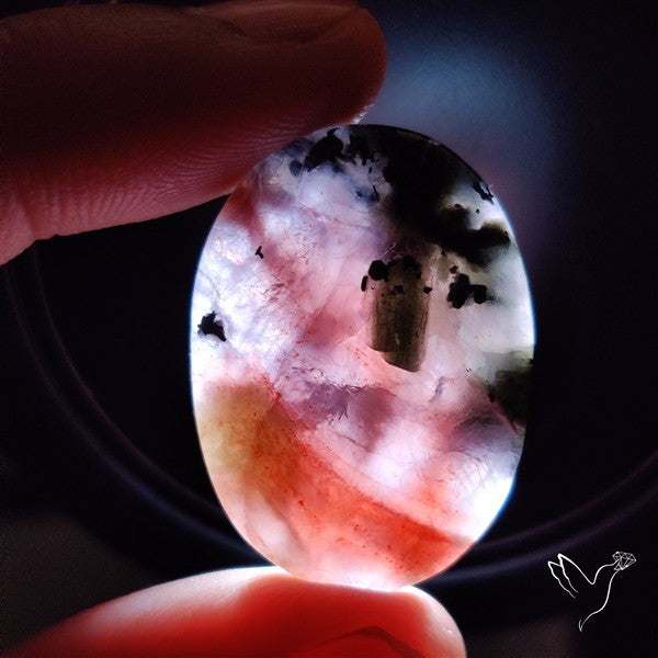 Bloodshot Iolite Sunstone Cabochon with Green Tourmaline Inclusion