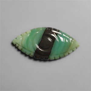 Indonesian Petrified Opalwood Evil Eye Carving